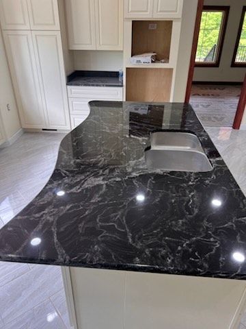 Granite island with curved edge