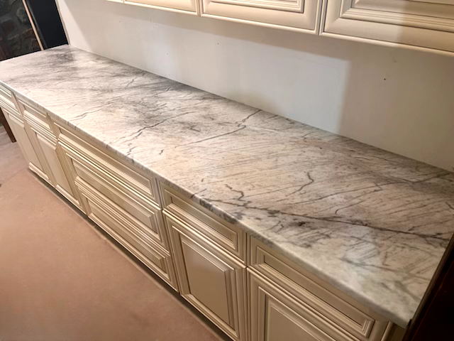 Quartzite - have a full slab image, and a full backsplash image